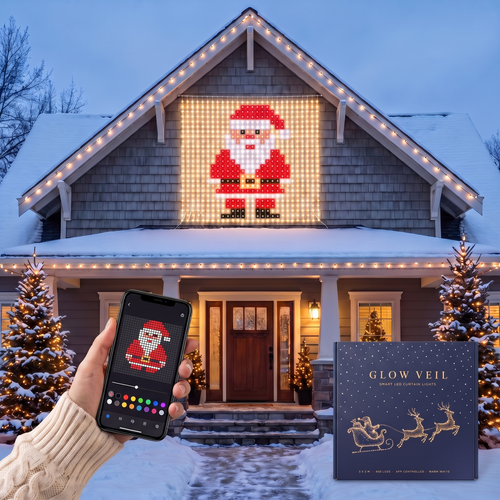 LED curtain showing a pixel Santa on a house gable, set from the phone app